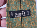 Hermès silk tie green ethnical pattern 7677TA