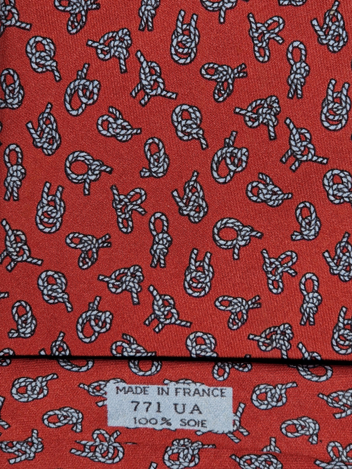 000771 Hermès tie red knot pattern 771 UA