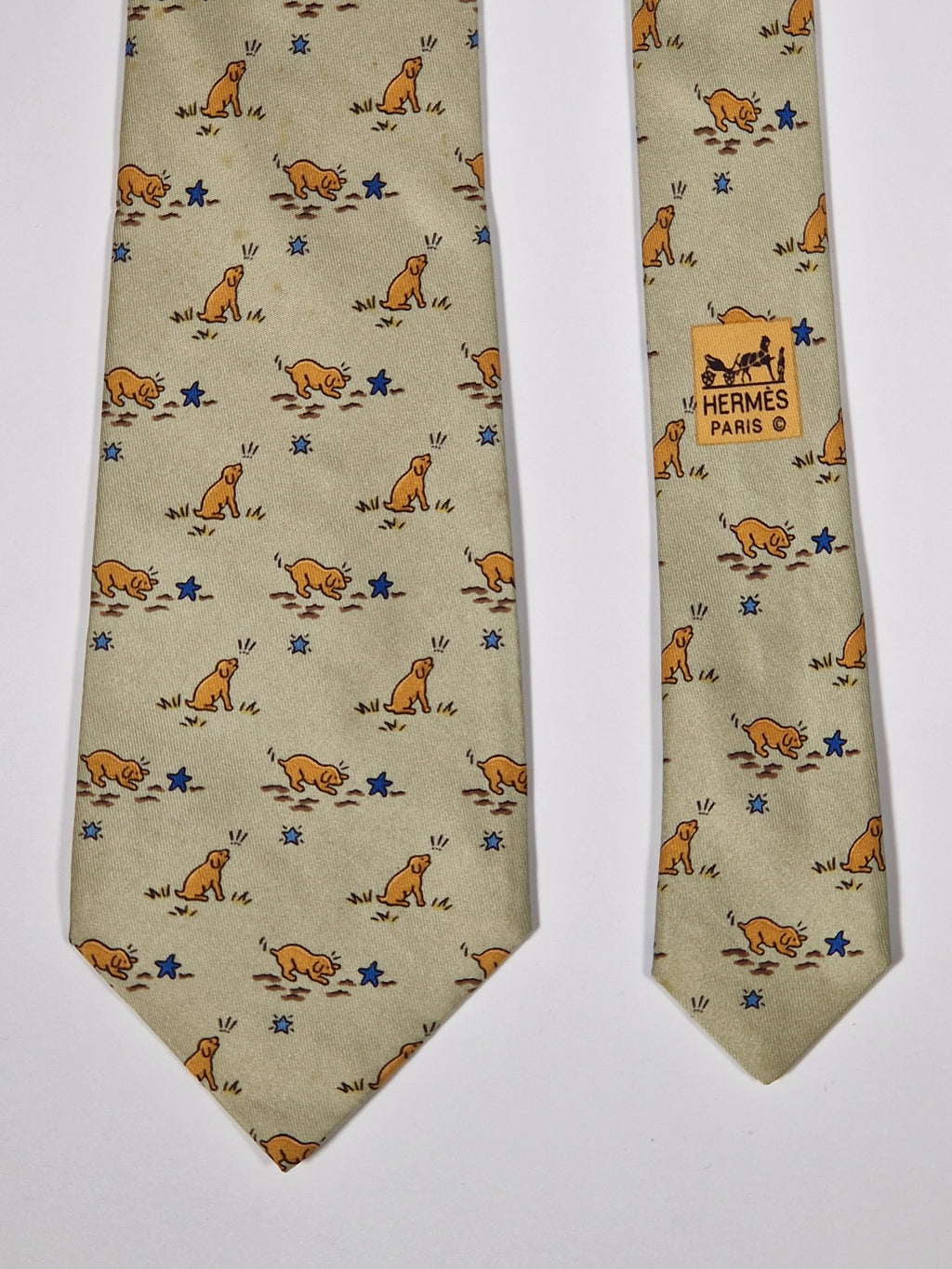 007784 Hermès tie beige puppy and star pattern 7784 FA