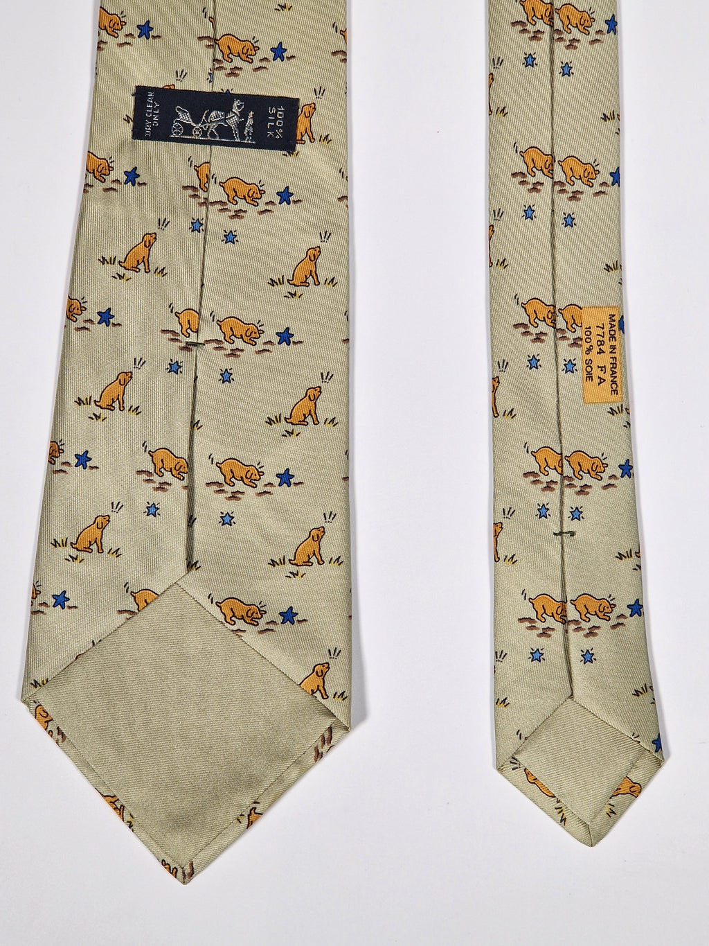 007784 Hermès tie beige puppy and star pattern 7784 FA