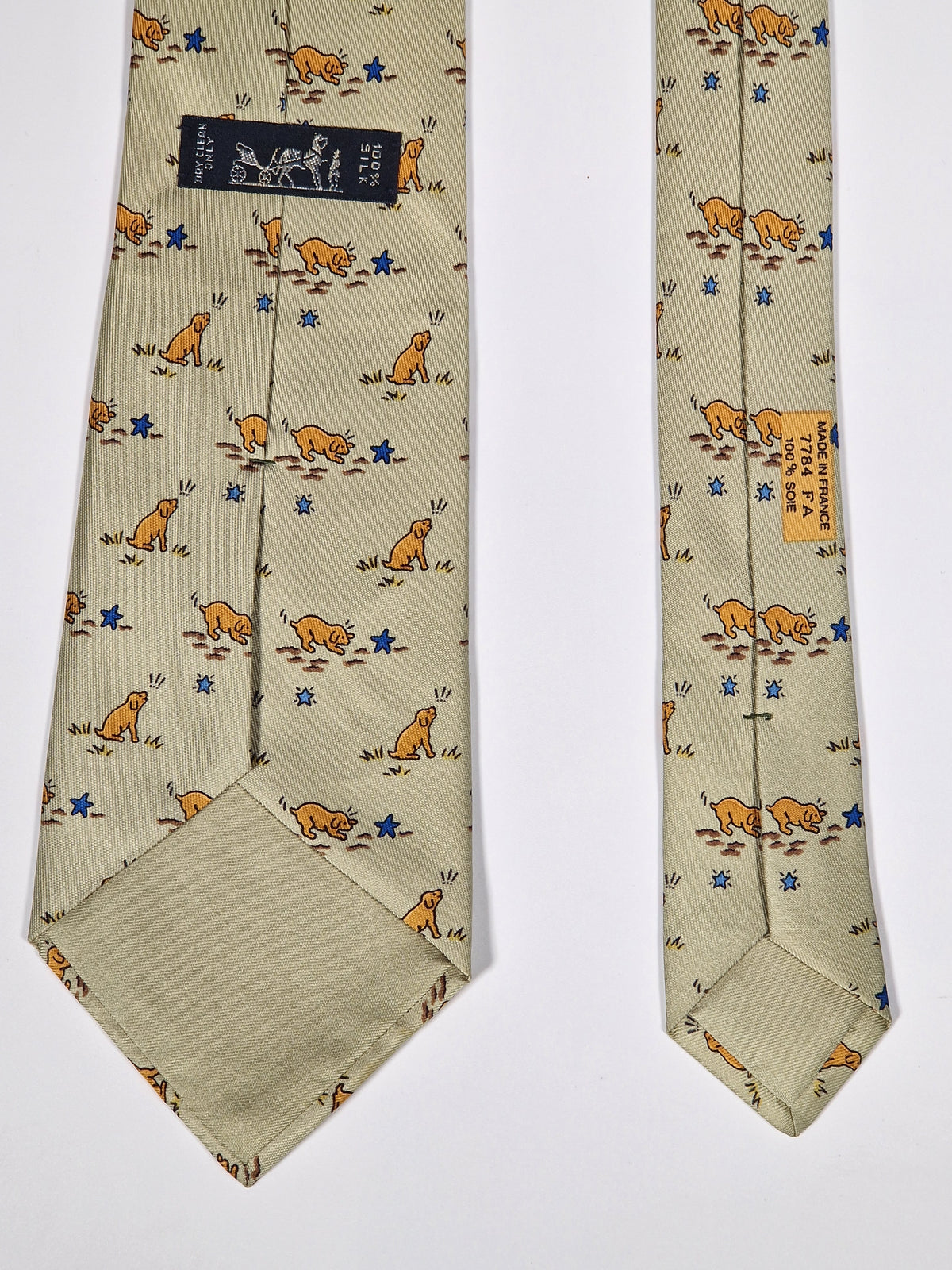 007784 Hermès tie beige puppy and star pattern 7784 FA