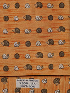 Hermès silk tie orange hedgehog and snail whimsical pattern 7850 UA