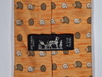 Hermès silk tie orange hedgehog and snail whimsical pattern 7850 UA