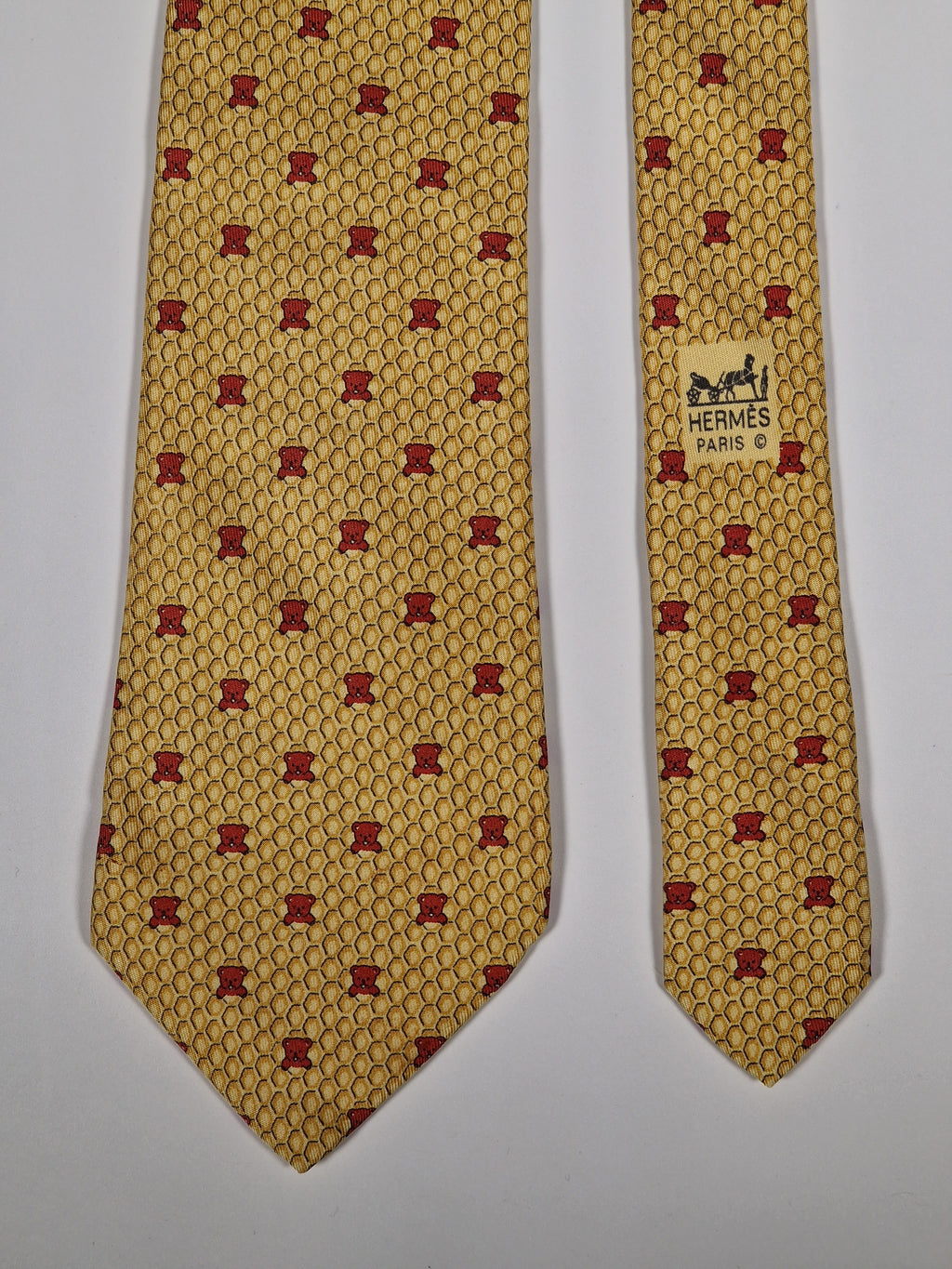 Hermès silk tie yellow bear honeycomb whimsical pattern 7920 MA
