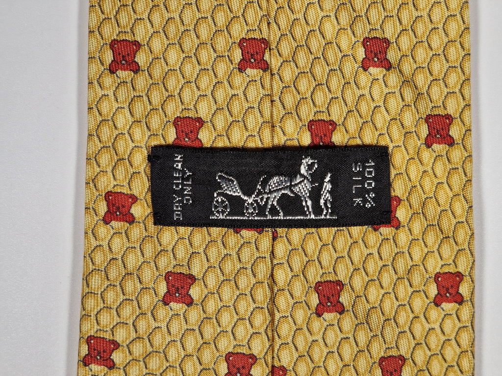Hermès silk tie yellow bear honeycomb whimsical pattern 7920 MA