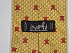 Hermès silk tie yellow bear honeycomb whimsical pattern 7920 MA