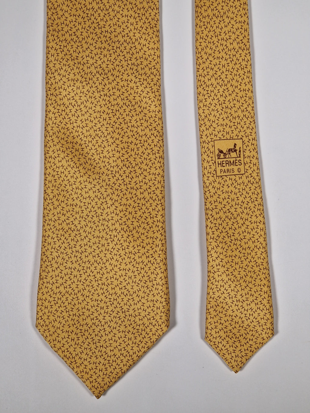 Hermès silk tie yellow H pattern 7926 MA