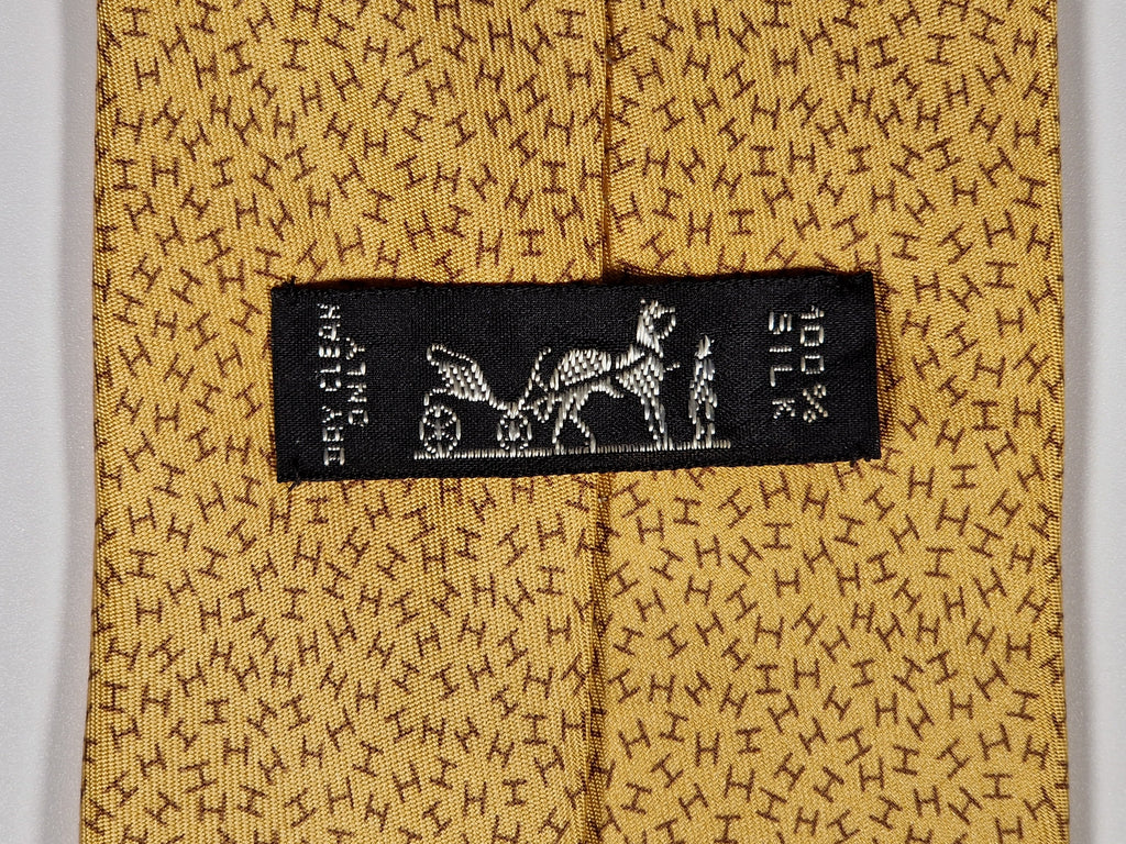 Hermès silk tie yellow H pattern 7926 MA