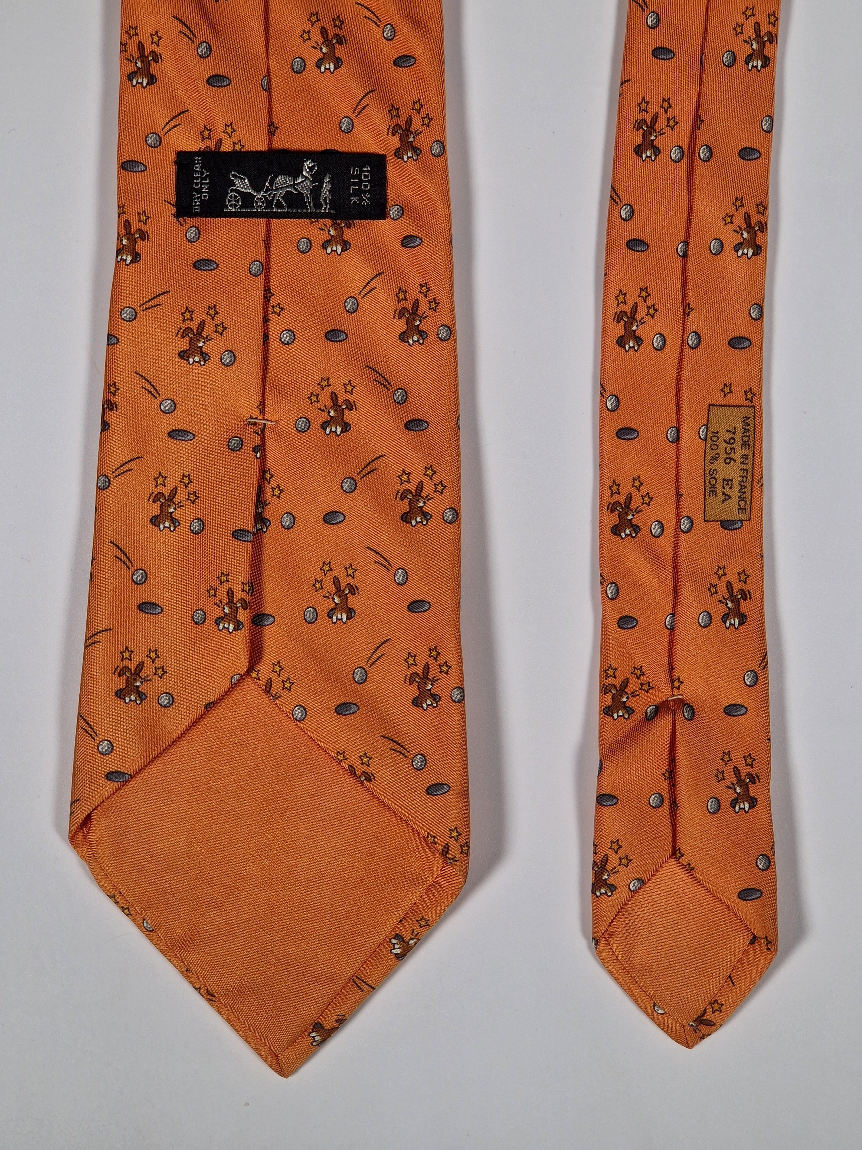 Hermès silk tie orange whimsical rabbit and golf pattern 7956 EA