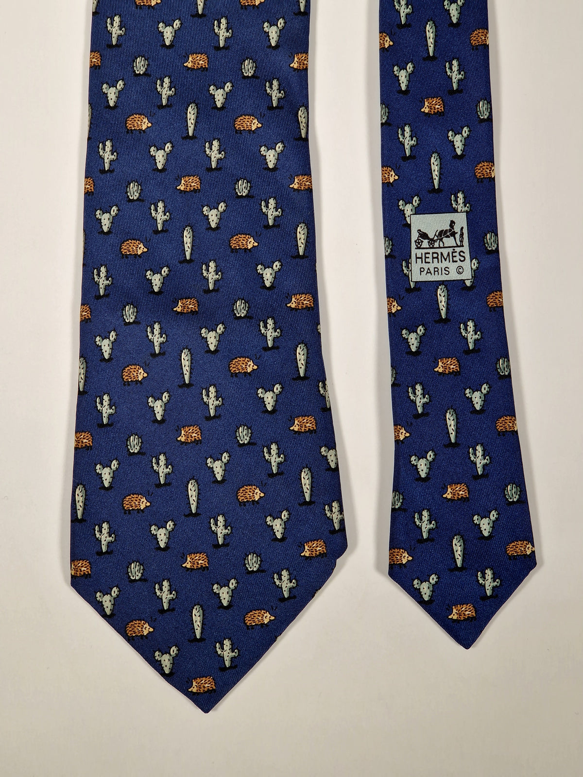 007988b Hermès tie blue whimsical hedgehog and cactus Hermès 7988 EA tie blue