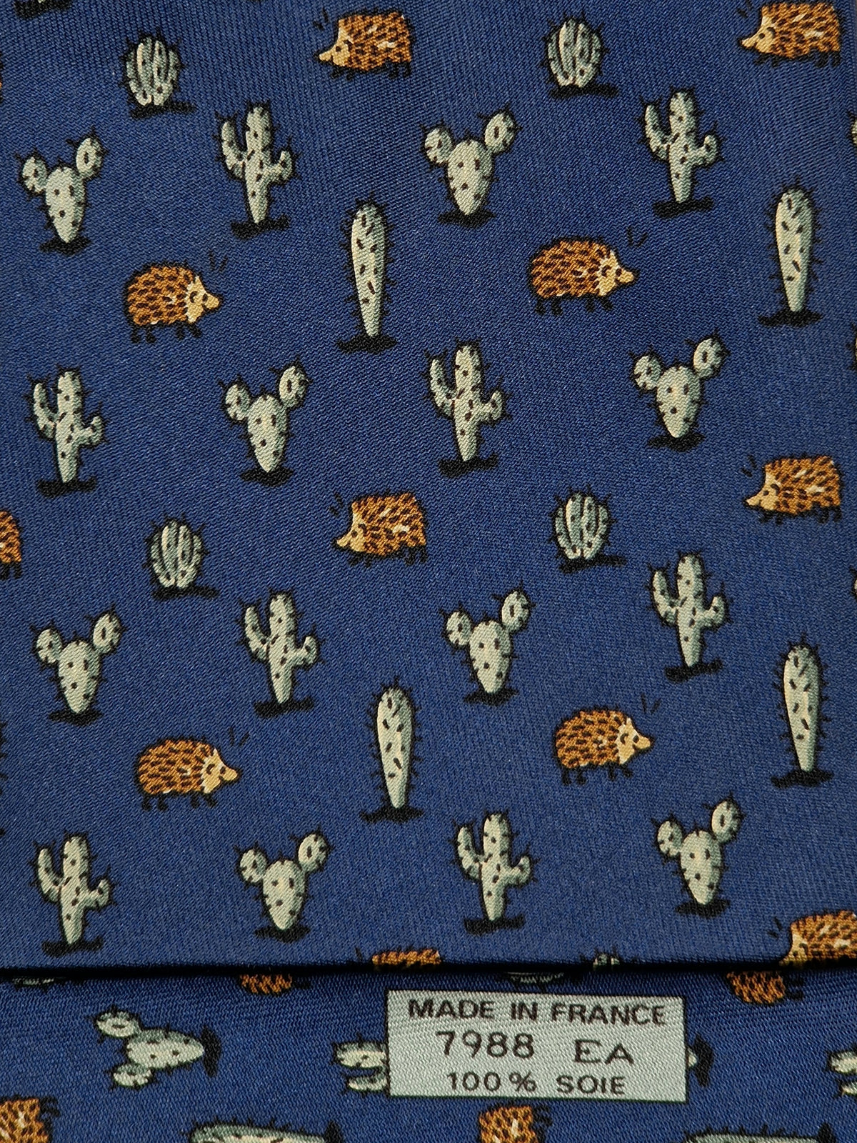007988b Hermès tie blue whimsical hedgehog and cactus Hermès 7988 EA tie blue