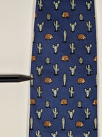 007988b Hermès tie blue whimsical hedgehog and cactus Hermès 7988 EA tie blue