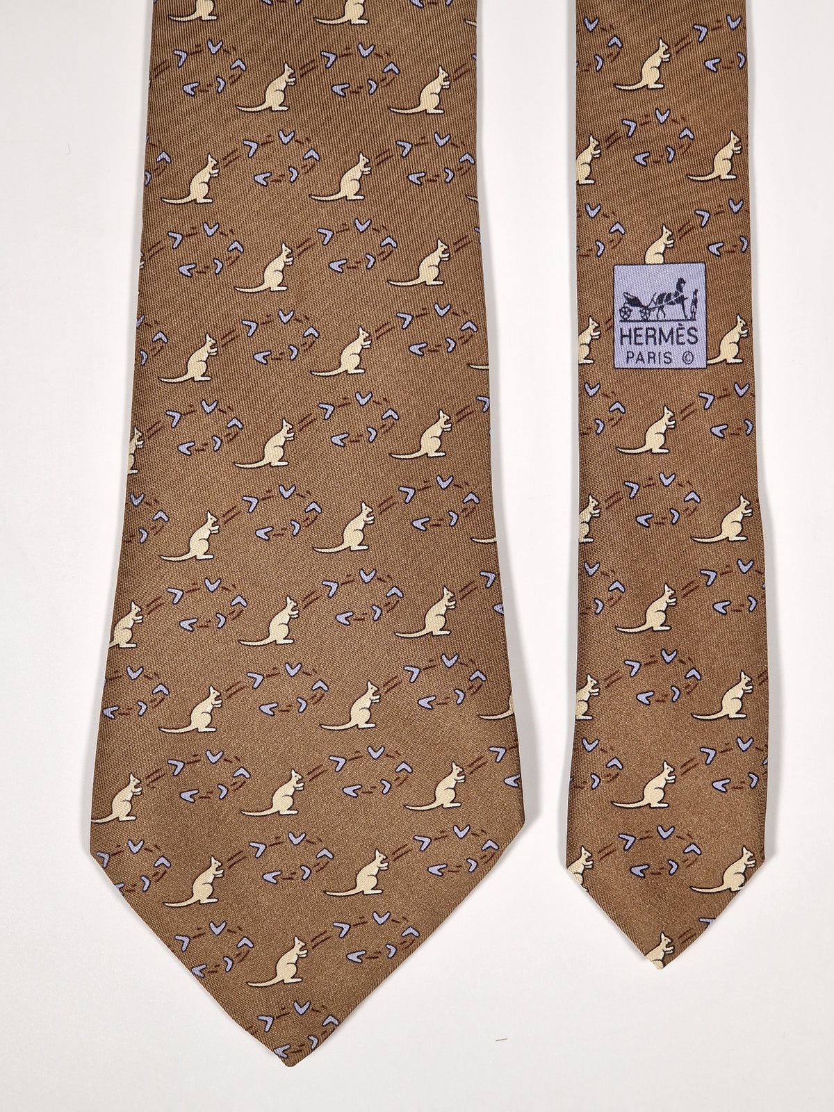 007994 Hermès tie brown whimsical kangaroo and boomerang pattern 7994 EA