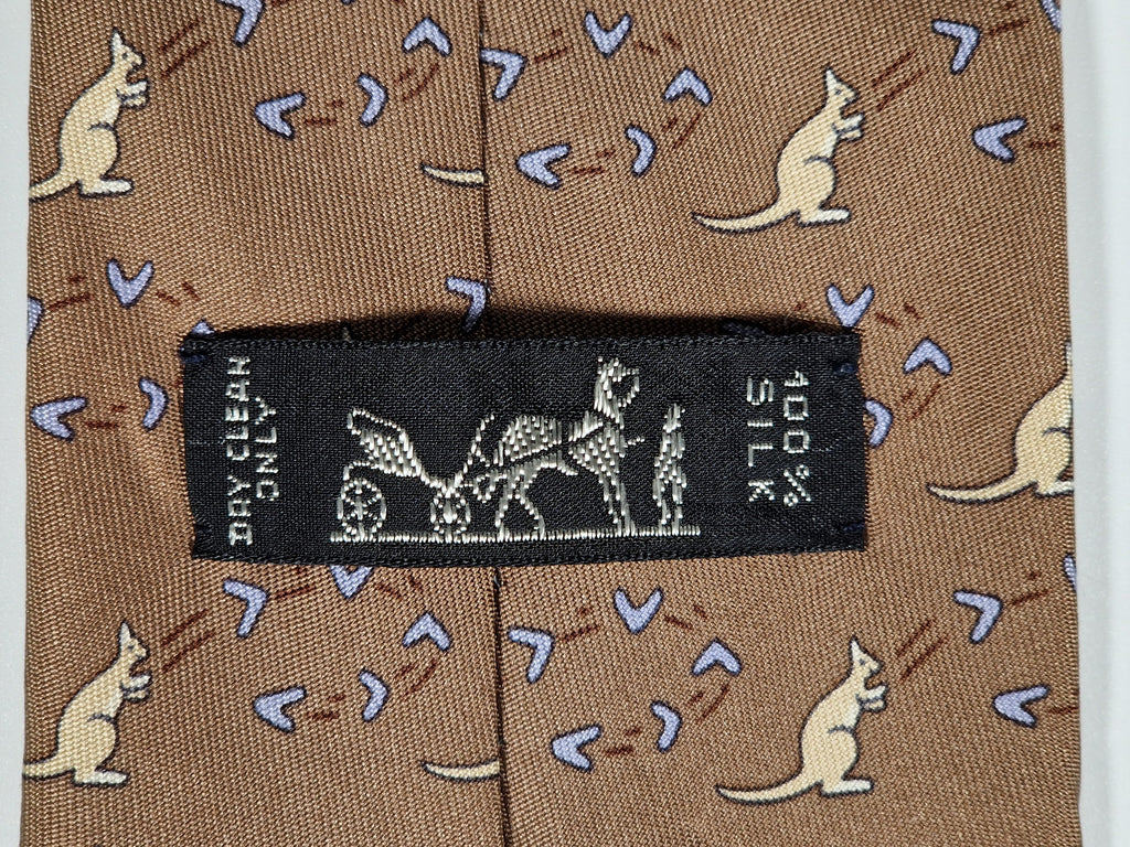 007994 Hermès tie brown whimsical kangaroo and boomerang pattern 7994 EA