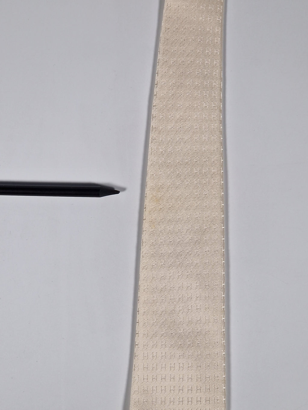 Hermés off white silk Faconnee H Tie